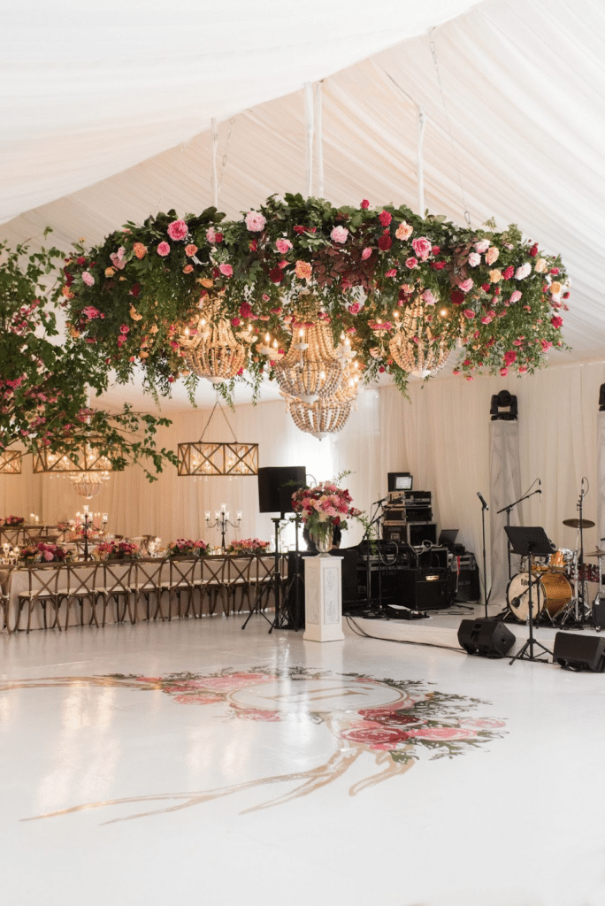 A WEDDING DECOR IN RING-A-RING-A ROSES AND CHANDELIERS floral hanging